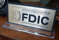 FDIC sign, New $250,000 Coverage, on base stand